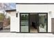 Outdoor balcony area with a modern ceiling, black columns, and glass railings at 425 S Pearl St, Denver, CO 80209