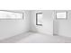 Bright, neutral bedroom with modern windows and plush carpet at 425 S Pearl St, Denver, CO 80209