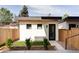 Modern home with light siding, black trim, and fresh landscaping at 425 S Pearl St, Denver, CO 80209