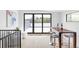 Bright living room with bar area and floor-to-ceiling sliding glass doors at 425 S Pearl St, Denver, CO 80209