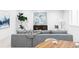 Living room featuring a comfortable couch, a game table, and stylish decor, perfect for relaxation and socializing at 425 S Pearl St, Denver, CO 80209
