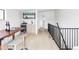 Bright living room with bar area and floor-to-ceiling sliding glass doors at 425 S Pearl St, Denver, CO 80209