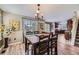 Inviting dining area showcasing hardwood floors, and backyard view at 5090 Miriam Ln, Parker, CO 80134