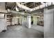 Unfinished basement with exposed ductwork, storage space, and potential for customization at 7801 Valley View St, Louviers, CO 80131