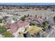 A beautiful aerial view of the neighborhood with mature trees and landscaping at 6068 W Utah Ln, Lakewood, CO 80232