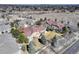 Aerial view showcasing a beautifully landscaped neighborhood with mature trees at 6068 W Utah Ln, Lakewood, CO 80232