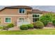 Well-manicured backyard with lush greenery, a lawn, and privacy fencing at 6068 W Utah Ln, Lakewood, CO 80232