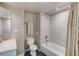 Nicely finished bathroom with tiled shower and bath combination and modern fixtures at 6068 W Utah Ln, Lakewood, CO 80232