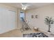 Bedroom featuring a ceiling fan, natural light, and closet for optimal comfort at 6068 W Utah Ln, Lakewood, CO 80232