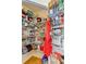 Well-organized walk-in pantry featuring ample shelving for storage with a variety of food items and supplies at 6068 W Utah Ln, Lakewood, CO 80232