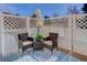 Cozy patio area with outdoor furniture, perfect for relaxing and enjoying the outdoors at 6068 W Utah Ln, Lakewood, CO 80232