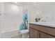 Bathroom featuring a shower with a patterned curtain at 21821 E 7Th Ave, Aurora, CO 80018
