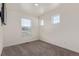 Bright, empty bedroom featuring plush carpeting and a neutral color palette at 21821 E 7Th Ave, Aurora, CO 80018