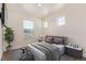 Comfortable bedroom featuring a large window and ample natural light at 21821 E 7Th Ave, Aurora, CO 80018