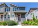Charming two-story home with a welcoming front porch and well-manicured landscaping at 21821 E 7Th Ave, Aurora, CO 80018