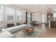 Open floor plan featuring a comfortable living room and a bright dining area near a modern kitchen at 21821 E 7Th Ave, Aurora, CO 80018