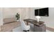 Stylish office with a modern desk, chair, TV, and sleek decor at 21821 E 7Th Ave, Aurora, CO 80018