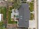 Stunning aerial view showcases a home with a manicured backyard and patio at 2905 Regis Dr, Boulder, CO 80305