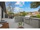 Backyard featuring an outdoor kitchen with grill, an outdoor dining area, and landscaping at 2905 Regis Dr, Boulder, CO 80305