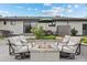 Relaxing backyard patio with an outdoor fire pit and cozy seating area at 2905 Regis Dr, Boulder, CO 80305