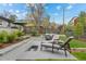 Inviting backyard patio featuring a water feature, lounge chairs, and mountain views at 2905 Regis Dr, Boulder, CO 80305