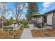 Lush backyard with a patio, outdoor kitchen, and comfortable lounge areas at 2905 Regis Dr, Boulder, CO 80305