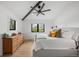 Spacious bedroom with lots of natural light, neutral decor, and hardwood flooring at 2905 Regis Dr, Boulder, CO 80305