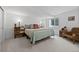 Cozy bedroom with soft carpet, a comfortable bed, and a window for natural light at 2905 Regis Dr, Boulder, CO 80305