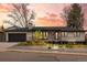 Charming single-story home featuring a landscaped front yard and an attached garage at 2905 Regis Dr, Boulder, CO 80305