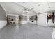 Spacious garage featuring epoxy flooring and slat wall storage for a well-organized space at 2905 Regis Dr, Boulder, CO 80305