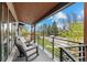 Inviting front porch with comfortable seating, perfect for relaxing outdoors at 2905 Regis Dr, Boulder, CO 80305