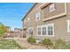 Spacious backyard with patio area, perfect for outdoor gatherings and relaxation at 3778 Happyheart Way, Castle Rock, CO 80109