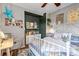 Bedroom featuring a whimsical aesthetic, desk area, and vibrant decor at 3778 Happyheart Way, Castle Rock, CO 80109