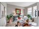 Bright home office featuring a white desk, drawers, natural light, plants and wood flooring at 3778 Happyheart Way, Castle Rock, CO 80109