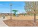 Community playground with swings, slide, and climbing structure, perfect for  at 3778 Happyheart Way, Castle Rock, CO 80109