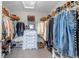 Organized walk-in closet with ample shelving and hanging space for clothes and shoes at 3778 Happyheart Way, Castle Rock, CO 80109