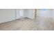 Expansive basement with new floors and fresh paint offering versatile space for various needs and storage at 6010 S Garland Way, Littleton, CO 80123