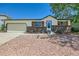 Charming single-story home with brick accents, well-maintained landscaping, and a two-car garage at 6010 S Garland Way, Littleton, CO 80123