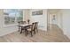 Cozy dining area featuring hardwood floors and lots of natural light at 12854 Clearview St, Firestone, CO 80504