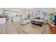 Spacious open-concept floor plan with living room flowing into a kitchen at 12854 Clearview St, Firestone, CO 80504