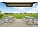 Covered picnic area with metal picnic tables, offering a pleasant outdoor dining space at 12854 Clearview St, Firestone, CO 80504