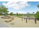 A well-equipped playground features climbing structures, slides, and ample space for recreational activities at 12854 Clearview St, Firestone, CO 80504