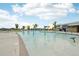 Gathering-friendly pool area with shallow water features, perfect for to splash and play at 12854 Clearview St, Firestone, CO 80504