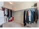 Spacious walk-in closet with clothing racks and shelving, providing ample storage space at 15957 E Elk Pl, Denver, CO 80239