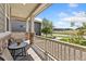 Inviting front porch with seating area, perfect for relaxing and enjoying the outdoors at 15957 E Elk Pl, Denver, CO 80239