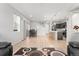 Open concept living space showcasing dining area and kitchen with modern finishes at 15957 E Elk Pl, Denver, CO 80239