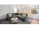 Open-concept living room showing seamless integration with kitchen and dining area, perfect for modern living at 12261 N Holly Way, Brighton, CO 80602