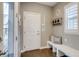 Functional entryway with a bench, storage, and natural light, perfect for welcoming guests at 8444 E 55Th Pl, Denver, CO 80238