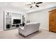 Finished basement featuring built-in shelving, plush carpet, and ample storage space at 407 S White Tail Dr, Franktown, CO 80116
