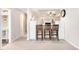 Basement bar with comfortable seating and a clean, modern design at 407 S White Tail Dr, Franktown, CO 80116